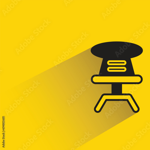 chair icon with shadow on yellow background