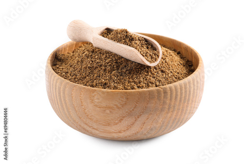 Bowl of aromatic caraway (Persian cumin) powder and scoop isolated on white