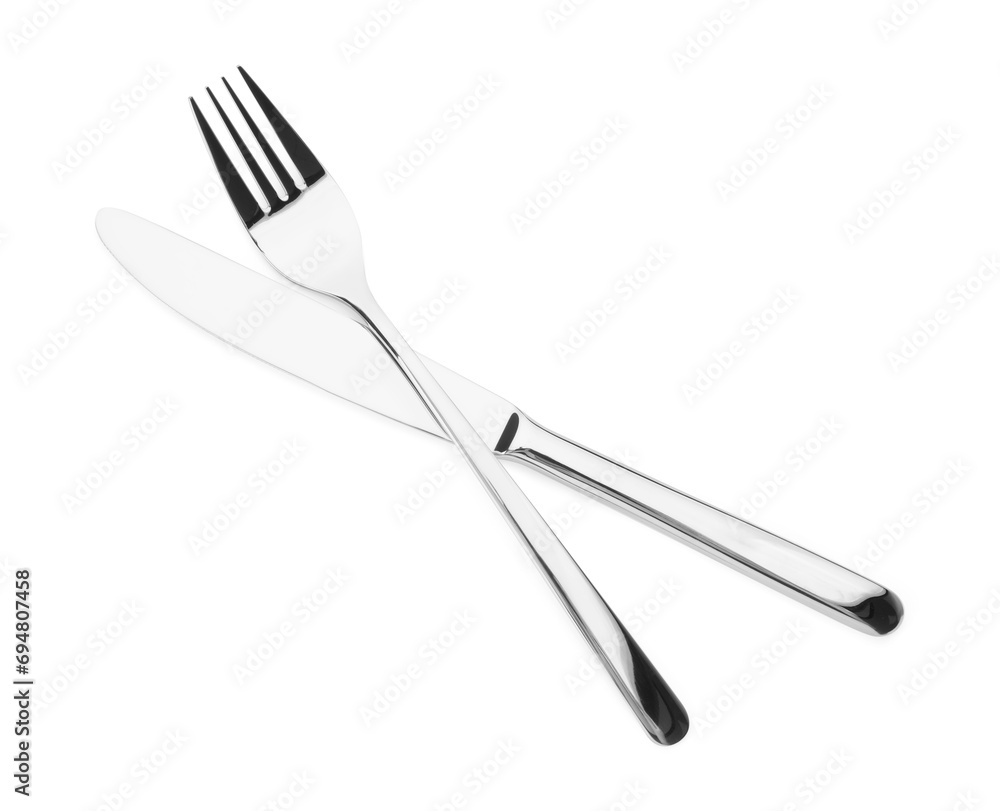 Shiny silver fork and knife isolated on white. Luxury cutlery Shiny silver fork and knife isolated on white. Luxury cutlery