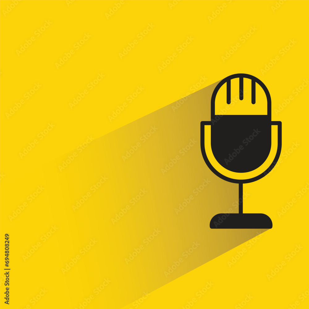 microphone in stand icon with shadow on yellow background microphone in stand icon with shadow on yellow background