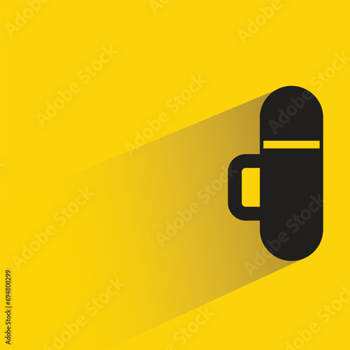water bottle with shadow on yellow background