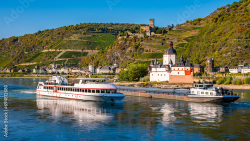 Panoramic view of Pfalzgrafenstein island castle in the middle of the river and Gutenfels castle on a rock above the village of Kaub. Tourist attractions in the romantic middle rhine valley in Germany photo