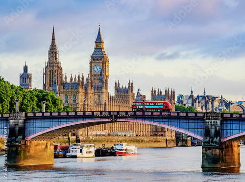 View over the River Thames towards the Palace of Westminster at sunrise, London, England, United Kingdom photo