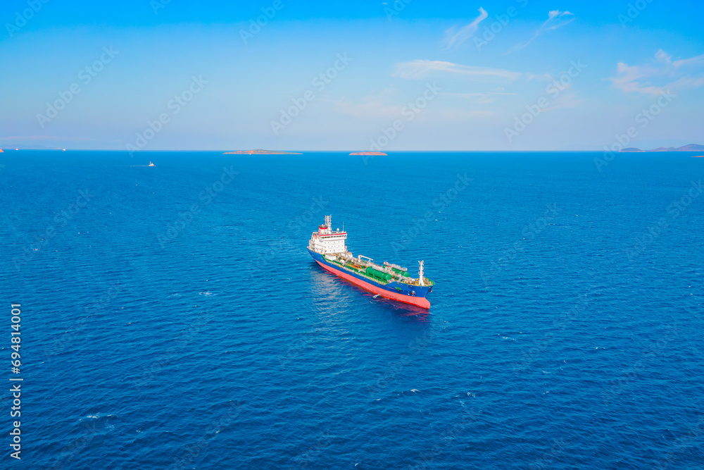 Aerial shot of Oil chemical tanker on anchorage in Mediterranean sea near logistics port