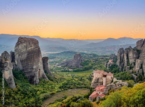 Monasteries of Rousanou and Saint Nicholas Anapafsas at dusk, elevated view, Meteora, Thessaly, Greece photo