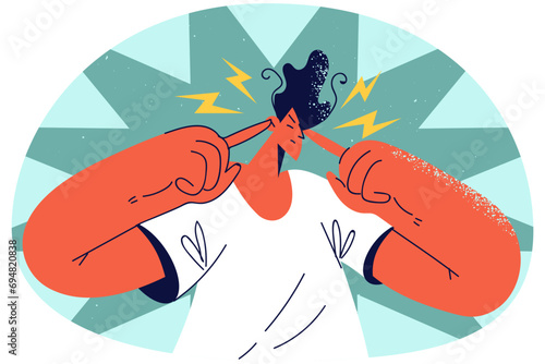 Unhappy man close ears annoyed with noise