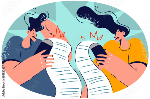 Stressed couple frustrated with payment lists