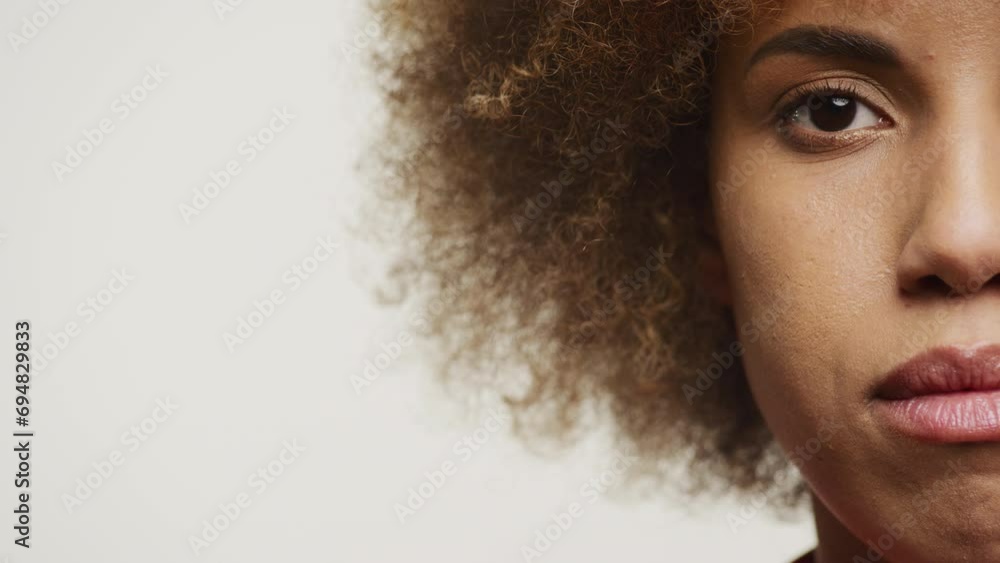 Half-Face Portrait of a Thoughtful Woman Half-Face Portrait of a Thoughtful Woman
