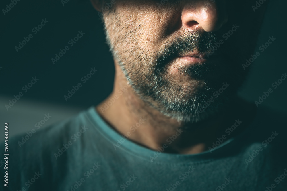 Obraz premium Midlife crisis of middle aged man. Closeup portrait of man in 40s in a depressed state of mind, sad and hopeless.