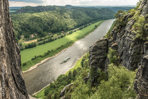 Basteiaussicht auf  Fluss Elbe mit Ausflugsdampfer und Panorama Elbsandsteingebirge	
 photo