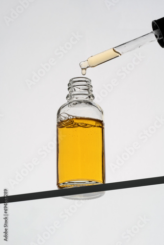 Vitamin C serum in dropper bottle for skincare photo