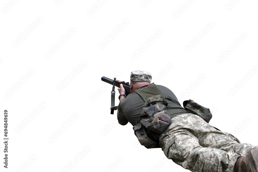A Ukrainian soldier shooting from a machine gun isolated A Ukrainian soldier shooting from a machine gun isolated