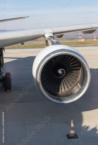 an inoperative jet engine of an aircraft and part of a wing photo