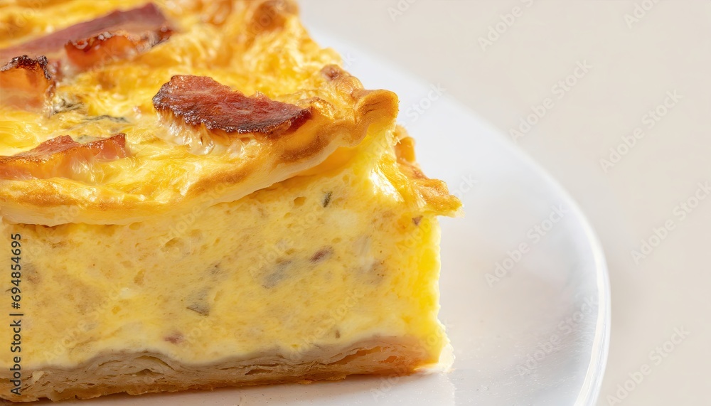 Gourmet Quiche Lorraine Slice Close-Up with Copyspace Gourmet Quiche Lorraine Slice Close-Up with Copyspace