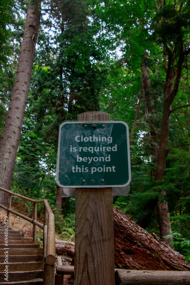 View of sign Clothing is required beyond this point on the way to the Wreck Beach in Vancouver View of sign Clothing is required beyond this point on the way to the Wreck Beach in Vancouver