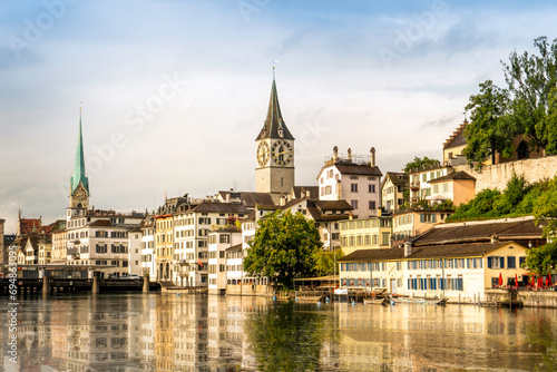 Scenic view of historic Zurich city center with famous Fraumunster and river Limmat at Lake Zurich,Switzerland photo