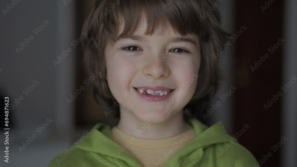 Portrait of Happy Little Child Bursting in Laugh. Kid Laughs Indoors Closeup. Confident Inquisitive Laughs Happy Caucasian Teenage Boy. Happy positive Child Laughing at Funny Joke Looking at Camera. Portrait of Happy Little Child Bursting in Laugh. Kid Laughs Indoors Closeup. Confident Inquisitive Laughs Happy Caucasian Teenage Boy. Happy positive Child Laughing at Funny Joke Looking at Camera.