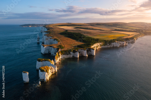 Aerial view of Old Harry Rocks at sunset, Handfast Point, Purbeck, Jurassic Coast, UNESCO World Heritage Site, Dorset, England photo