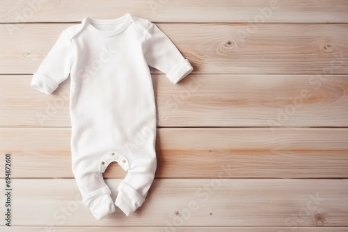 Blank white baby bodysuit mock up. Empty new born fabric sleepwear mock up, top view