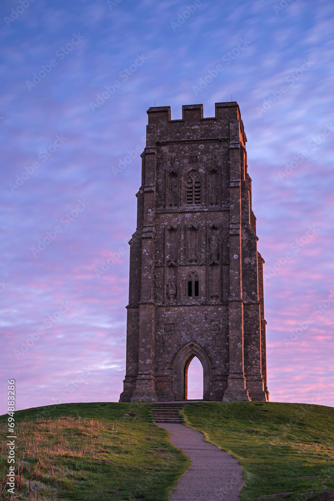 St. Michael's Tower on Glastonbury Tor at dawn in winter, Glastonbury, Somerset, England, United Kingdom, Europe St. Michael's Tower on Glastonbury Tor at dawn in winter, Glastonbury, Somerset, England, United Kingdom, Europe