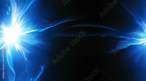 Explosion of blue light in a black background representing ideas and new creations