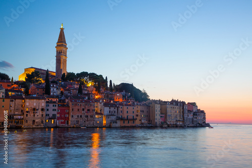 Waterfront and Tower of Church of St. Euphemia in the evening, Old Town, Rovinj, Croatia photo