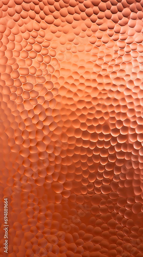 Hammered copper plate texture with a lustrous, dimpled surface.
