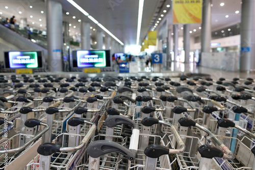 Baggage trolleys in arrivals area, International Airport, Ho Chi Minh City, Vietnam, Indochina, Southeast Asia, Asia photo