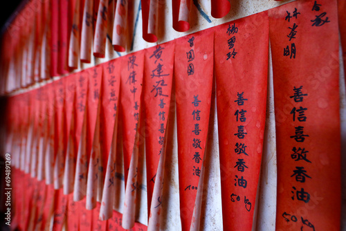 The Thien Hau Temple, the most famous Taoist temple in Cholon, red slips bearing wishes, Ho Chi Minh City, Vietnam photo