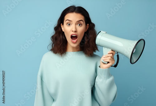 Young shocked excited happy woman wear casual clothes hold in hand megaphone scream announces discounts sale Hurry up point 