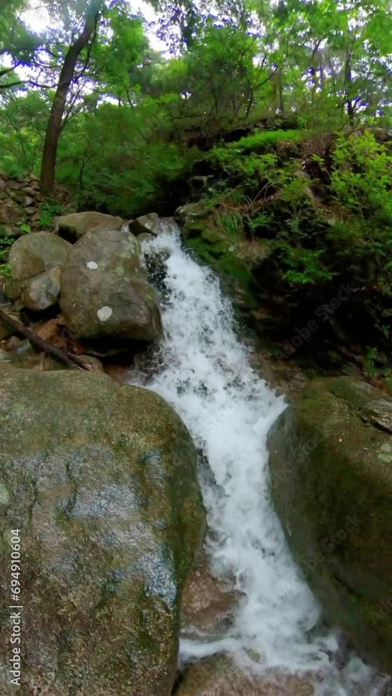 A cool stream that pours like a waterfall after a rain. A cool stream that pours like a waterfall after a rain.