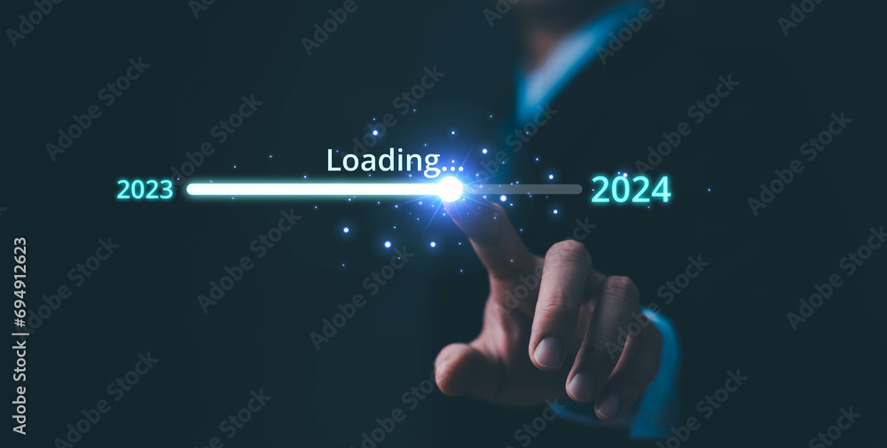 Businessman touch on loading progress from 2023 to 2024,Planning and challenge strategy in new year 2024 Concept. New business startup in 2024. New year 2024 is loading, calendar date, end of the year - obrazy, fototapety, plakaty 