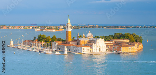 Aerial view of Saint George Island, Italian: Isola San Giorgio, with Campanile San Giorgio in Venetian Lagoon, Venice, Veneto Region, Italy. Photography on sunny summer day photo