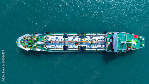 Aerial top view LPG gas ship, Ship tanker gas LPG top view on the sea for transportation, Liquefied Petroleum Gas tanker or LPG anchored in deep blue ocean sea.
