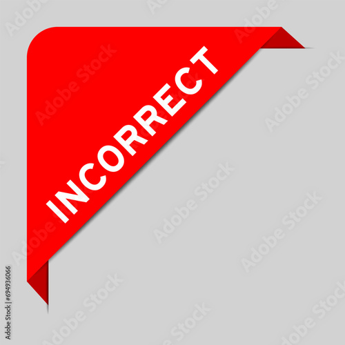 Red color of corner label banner with word incorrect on gray background