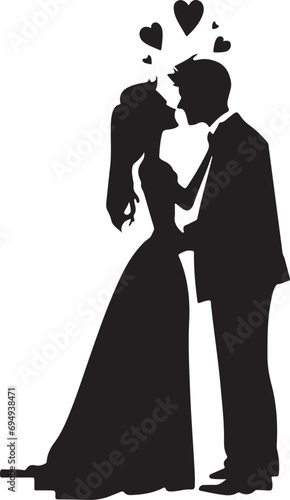 A silhouette of a bride and groom kissing