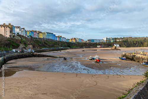 A view from the harbour at low tide in Tenby, Wales on a sunny day photo