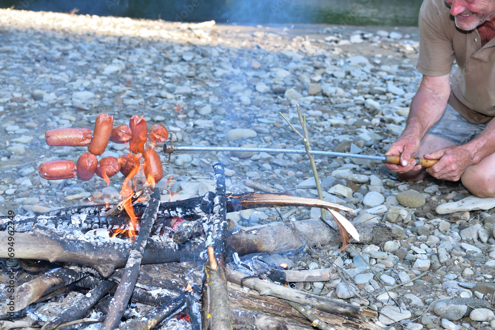 Picnic and Camping in nature by the river with the whole family
