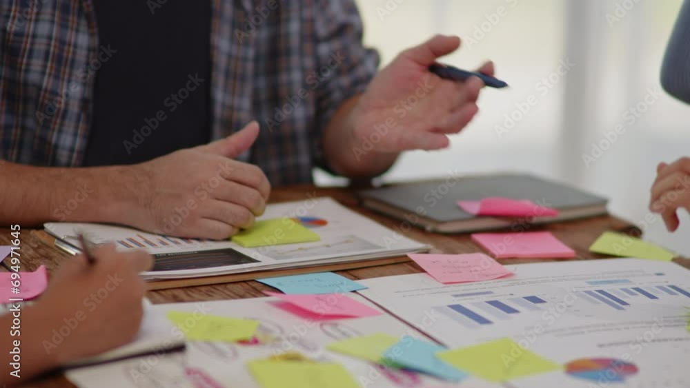 Close up of hands teamwork business startup group are meeting working and brainstorming for new business Close up of hands teamwork business startup group are meeting working and brainstorming for new business