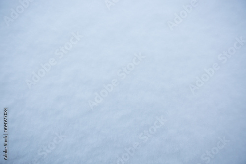 Macro photo of white snow in winter, snow texture.