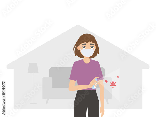 Woman wearing a mask uses alcohol to disinfect at home to prevent new coronary pneumonia