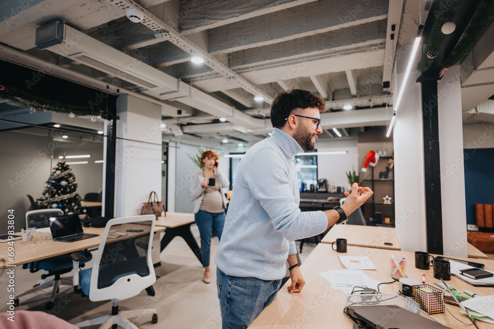 Fototapeta premium Business team discussing financial growth and market analysis.