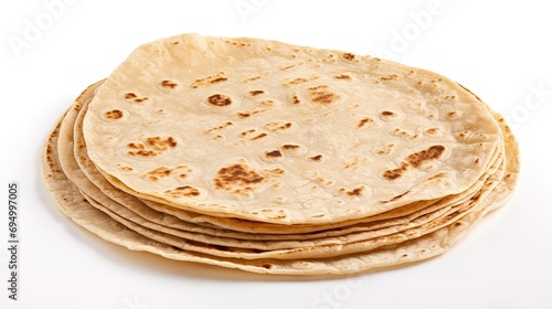 Freshly made plain tortilla, flat and ready for use in various culinary applications, isolated on a white background