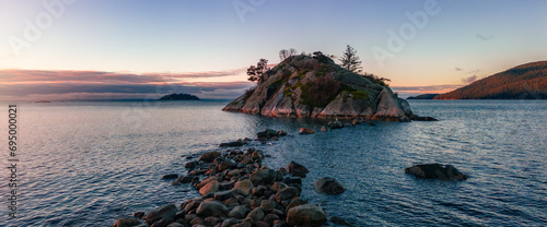 Rocky Shore on Pacific Ocean West Coast. Sunny Sunrise.