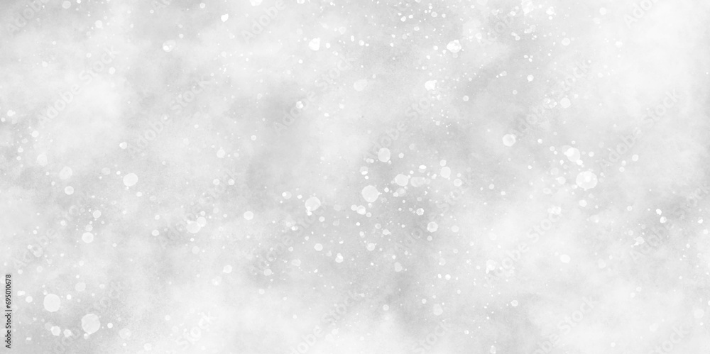 Winter snowfall in the winter season with particles, sunshine or sparkling lights and glittering glow winter morning of snow falling background, abstract bokeh glitter background on blurred blue.