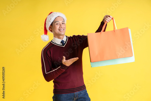 adult, advertisement, asian, attractive, background, bag, black friday, buy, cheerful, chinese, christmas, discount, enjoy, excited, festival, filipinos, gesture, gift, handsome, happiness, happy, hat