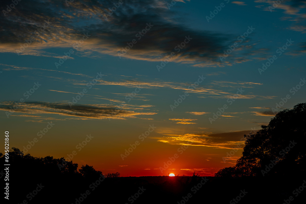 Fototapeta premium Wonderful colorful idyllic surreal sky at dawn