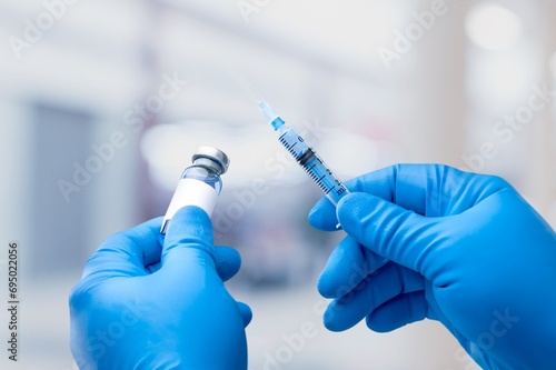 Professional doctor hold injection for treatment. photo