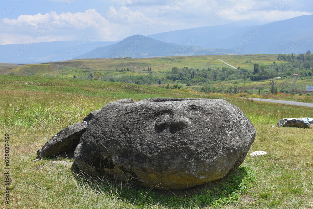 Pokekea megalithic site in Indonesia's Behoa Valley, Palu, Central Sulawesi.	
