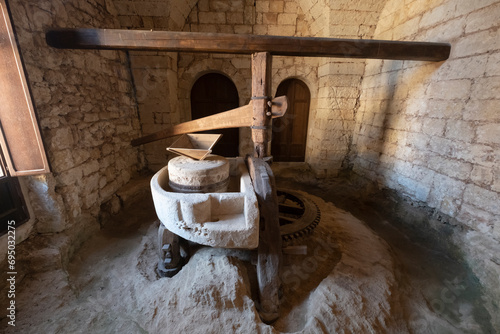 Photos Ancient oil mill underground mill Grey brick walls